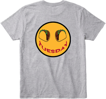 Back view Heather gray t-shirt with a yellow smiley face graphic featuring tacos and the word 'TUESDAY' smile with black trim.