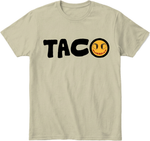 Khaki t-shirt with black 'TACO' text and a yellow taco graphic on a transparent background.