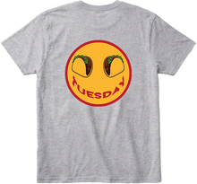 Back view Taco Tuesday t-shirt with large smiley face design featuring tacos and the word 'Tuesday' smile with red trim.